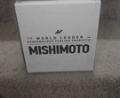 Mishimoto For Wheel Spacers, 5X120, 67.1 Center Bore, M14X1.25, 15MM Thick Black. Fixed Price $109.00.